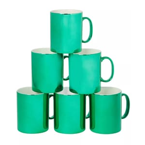 A set of six glossy green ceramic mugs stacked in a pyramid arrangement.