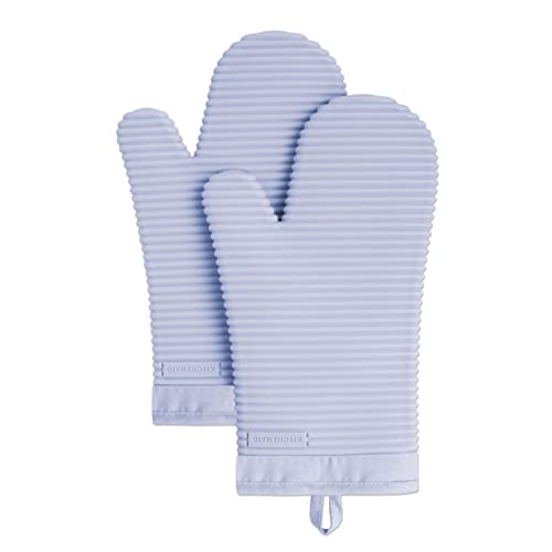 A pair of light purple, ribbed silicone oven mitts with hanging loops.