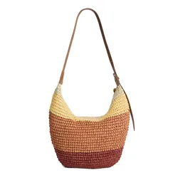 A multicolored woven shoulder bag with horizontal stripes in shades of brown, orange, and yellow, featuring a brown leather strap.
