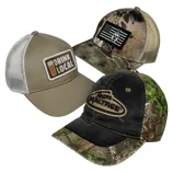A 3-pack of baseball caps featuring different designs: one with a \“Drink Local\“ patch, another with a camouflage and black flag pattern, and the third with \“Team Realtree\“ on a black and green camo background.