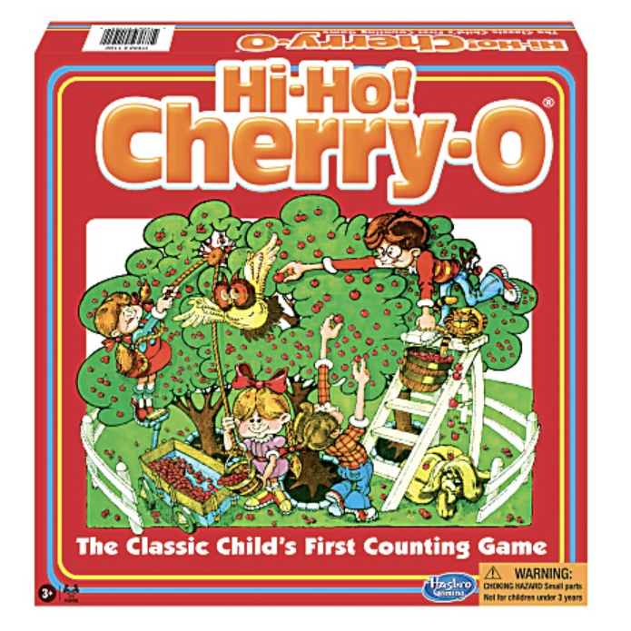 Hi-Ho! Cherry-O board game, designed as a child's first counting game, features colorful illustrations of children picking cherries from a tree. Recommended for ages 3 and up, includes a warning for small parts.