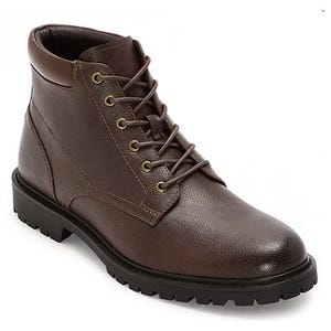 A brown leather lace-up boot with a textured finish and black rubber sole suitable for rugged and casual wear.