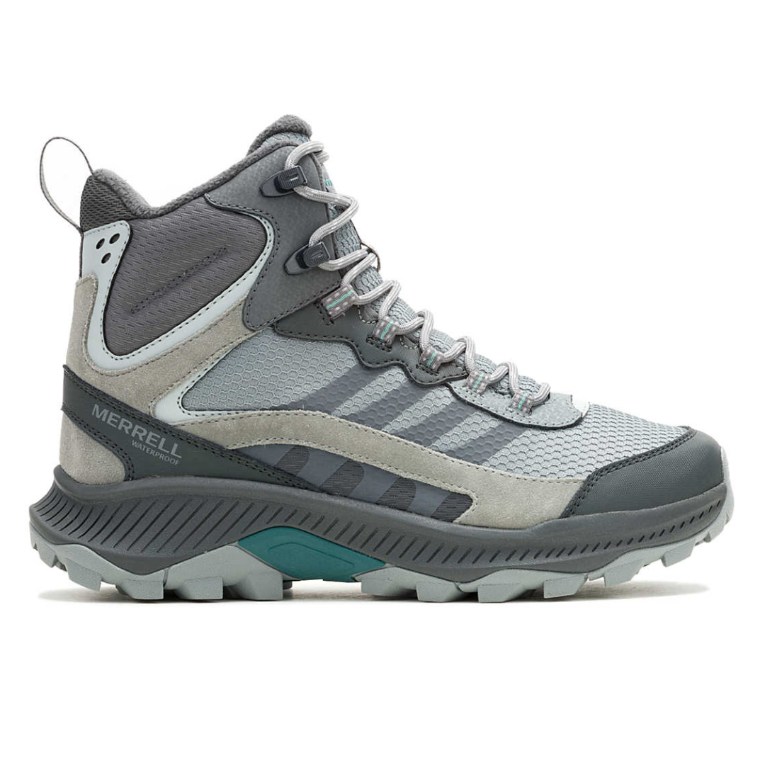Merrell waterproof hiking boot in shades of gray, featuring a high-top design with mesh panels, suede accents, durable tread, and secure lacing system.