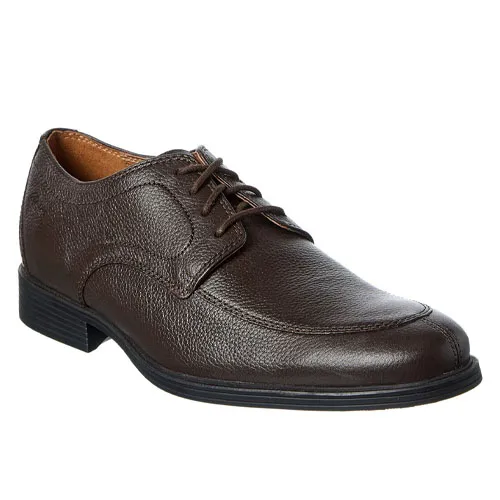 A brown leather lace-up dress shoe with a textured finish and a black sole.