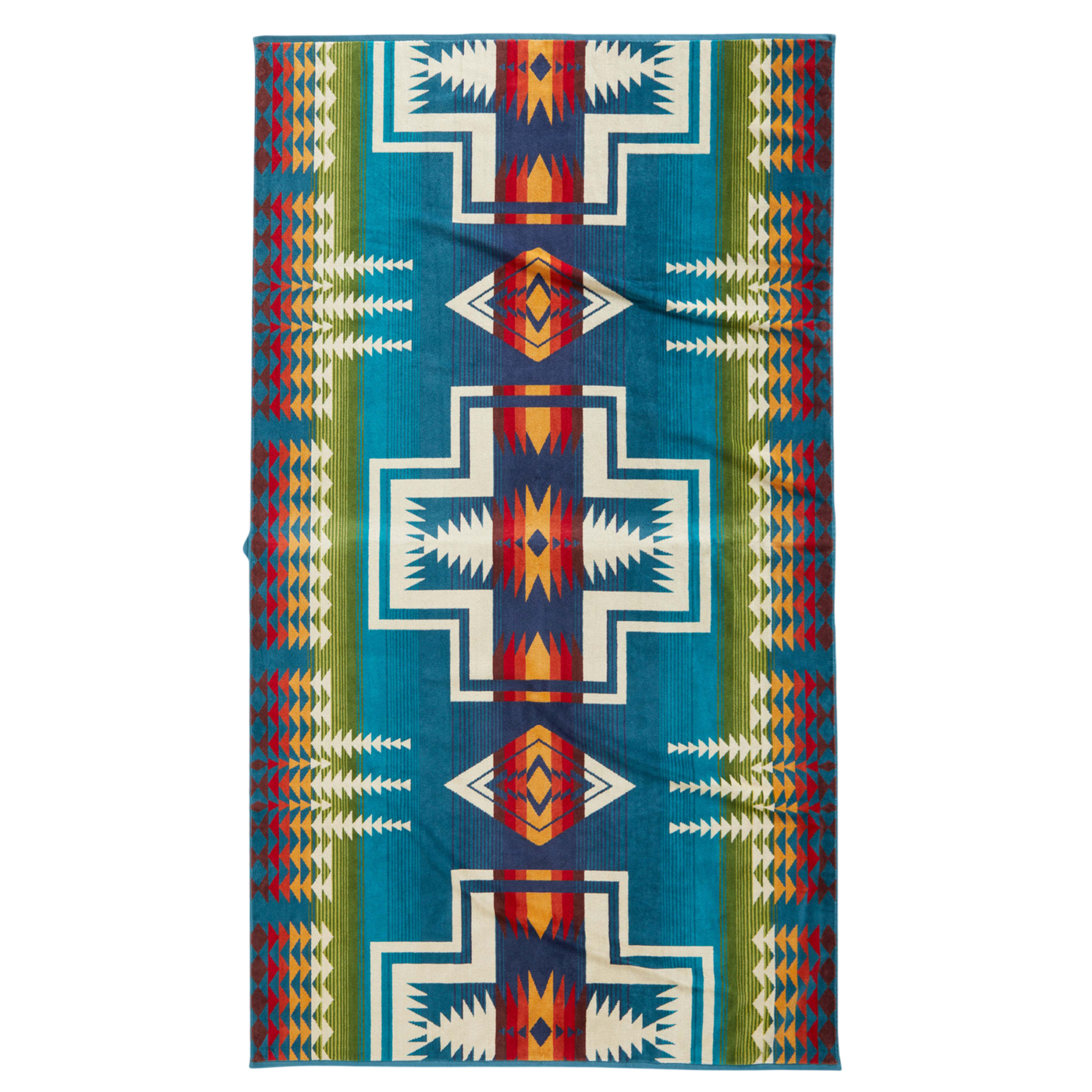 A colorful patterned blanket with geometric designs in blue, red, white, green, and orange tones, featuring bold lines and shapes arranged symmetrically.