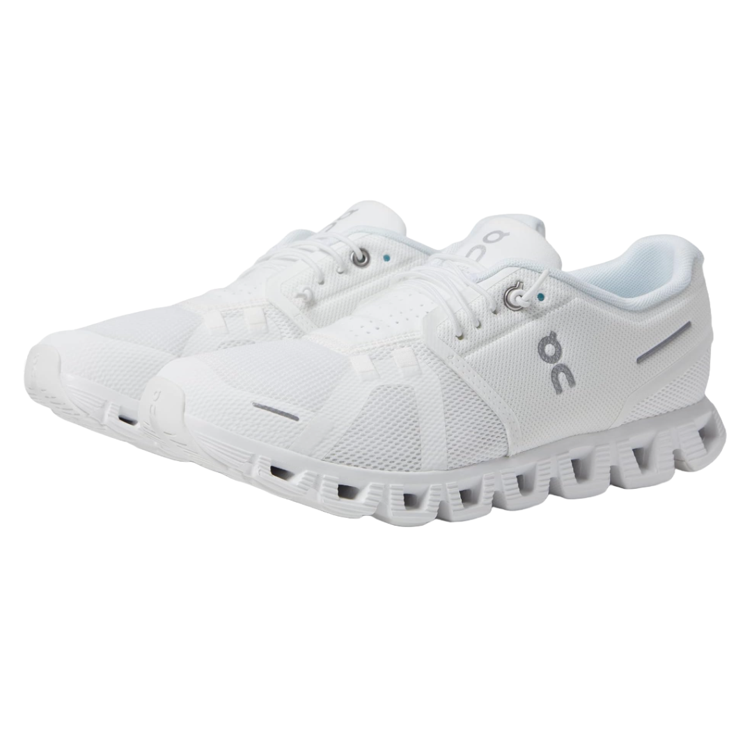 The On Women's Cloud 5 Shoes are white athletic sneakers featuring a lightweight mesh upper and unique cloud cushioning soles for enhanced comfort and performance, with lace-up closures and subtle brand logos.