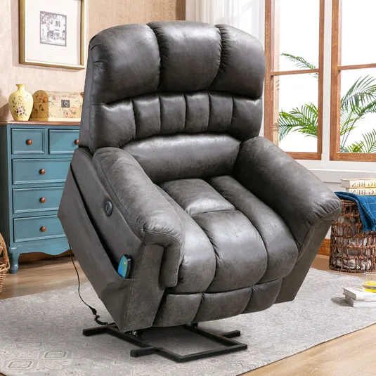 A plush, padded recliner chair with an attached remote control, in a room with a blue chest of drawers and decorative items.