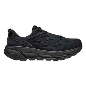 Hoka Clifton L Suede Walking Shoes feature a black design with a suede upper and cushioned sole for comfort and support. They have a sleek, modern look with cut-out details on the sides and a thick, textured sole.