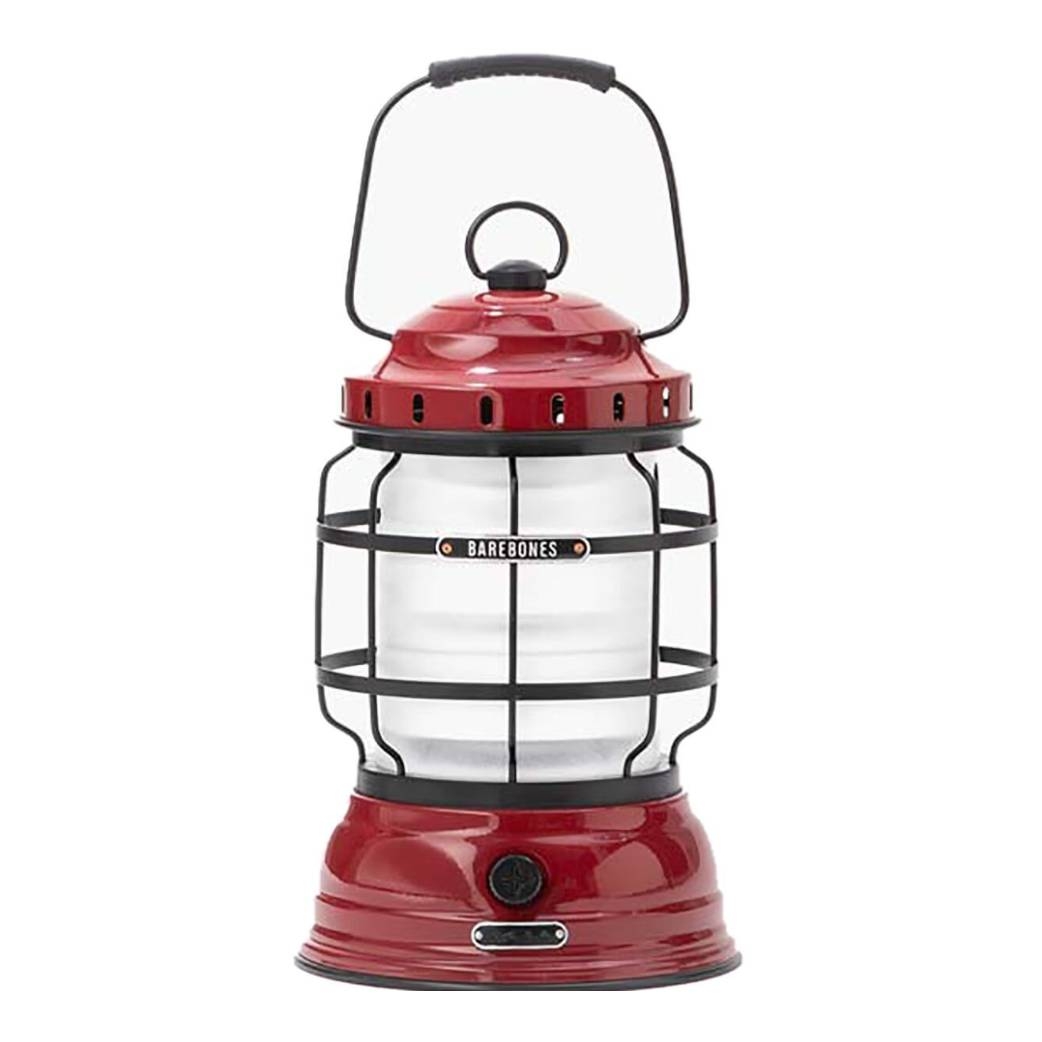 A red and black vintage-style lantern with a metal cage design and carrying handle from Barebones.