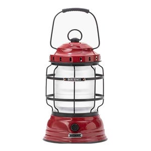 A red and black vintage-style lantern with a metal cage design and carrying handle from Barebones.