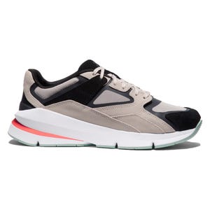 Under Armour Forge 96 Shoes feature a retro-inspired design with a combination of beige, black, and gray mesh and suede uppers. They have a thick white midsole with a pink accent stripe for added style.