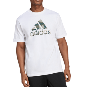 White Adidas t-shirt featuring a camouflage-patterned logo on the chest, paired with black shorts.