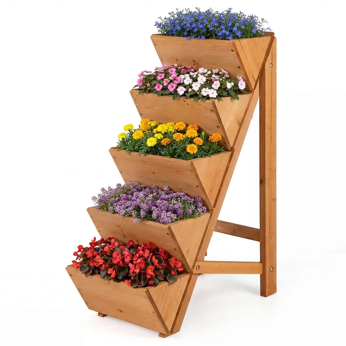 A wooden tiered planter stand displaying various colorful flowers in a cascading arrangement.