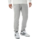 Grey sweatpants paired with white and black Adidas sneakers.