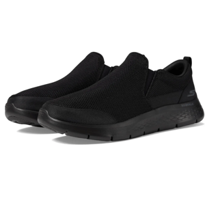 A pair of black Skechers slip-on sneakers with a mesh fabric upper and a flexible traction outsole.