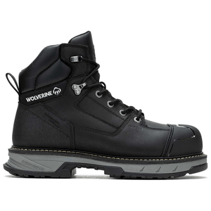 A black Wolverine branded work boot with a composite toe, rugged sole, and lace-up design. The boot features the \“Energybound\“ sole technology indicated on the heel.