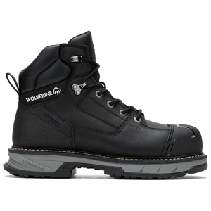 A black Wolverine branded work boot with a composite toe, rugged sole, and lace-up design. The boot features the \“Energybound\“ sole technology indicated on the heel.