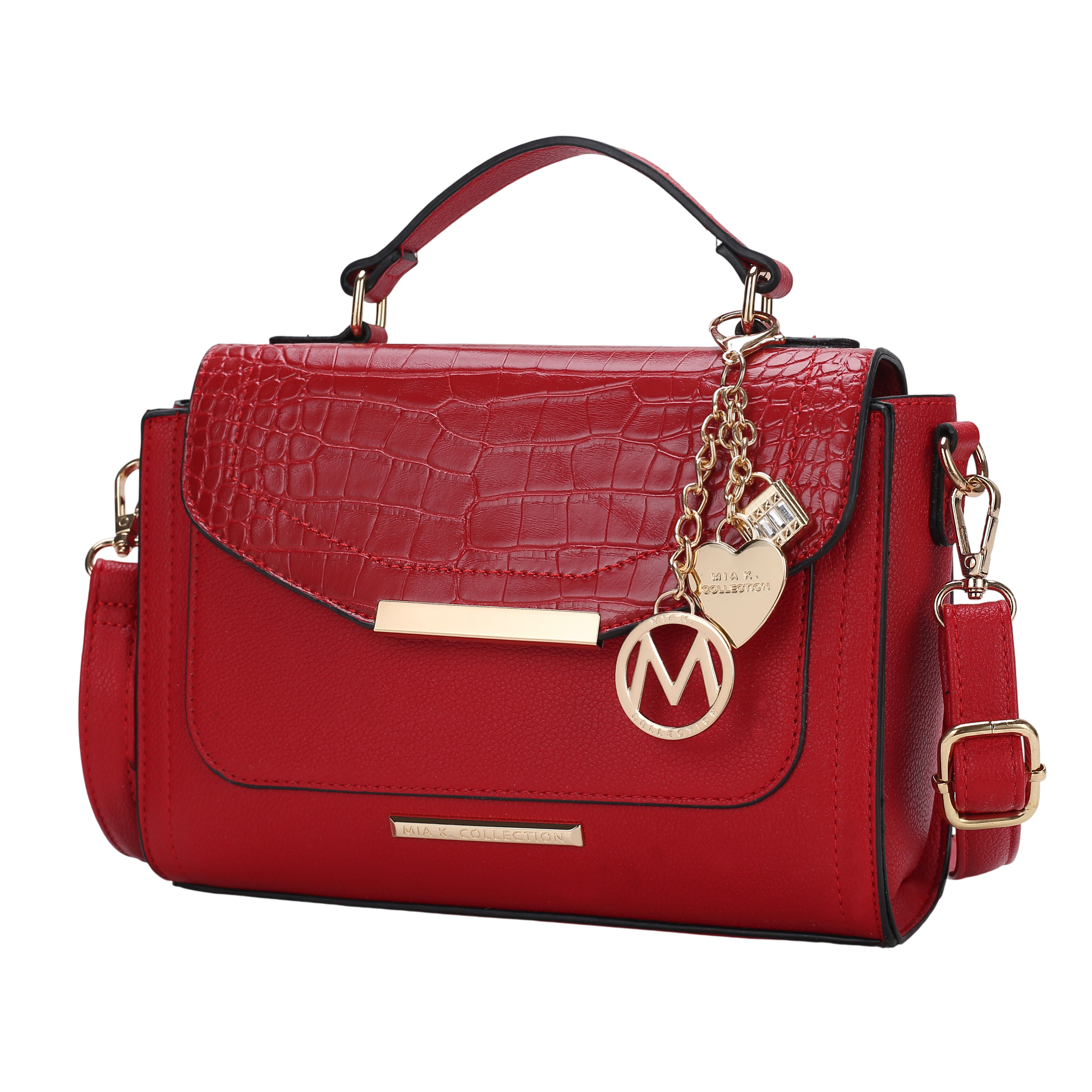 Red handbag with crocodile-textured flap, gold accents, top handle, detachable shoulder strap, and hanging charm with heart and circular pendants.