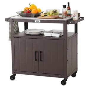 A dark brown rolling kitchen cart with a stainless steel top, featuring utensils, a salad, plates, and condiments. It includes storage cabinets and has a towel hanging on the side, providing both preparation and storage space.