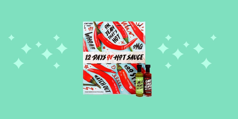 a hot sauce advent calendar on a green background