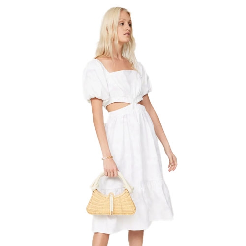 A white midi dress with puffed short sleeves, a square neckline, and side cut-outs, paired with a woven handbag.