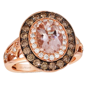 Le Vian ring featuring an oval morganite center stone encircled by white diamonds, set in rose gold. The band is adorned with additional brown diamonds, enhancing its intricate design.