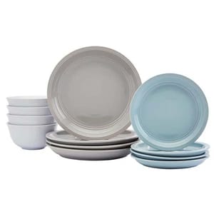 A dinnerware set featuring four white bowls, three gray plates, and three light blue plates. The set includes both larger dinner plates and smaller salad plates.