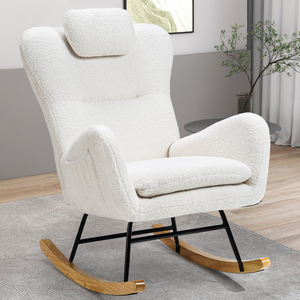 A cozy, white Sherpa rocking chair with wing-back design, plush cushions, and black metal frame accented by wooden rockers, set in a modern living room.
