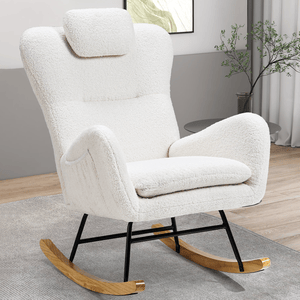A cozy, white Sherpa rocking chair with wing-back design, plush cushions, and black metal frame accented by wooden rockers, set in a modern living room.