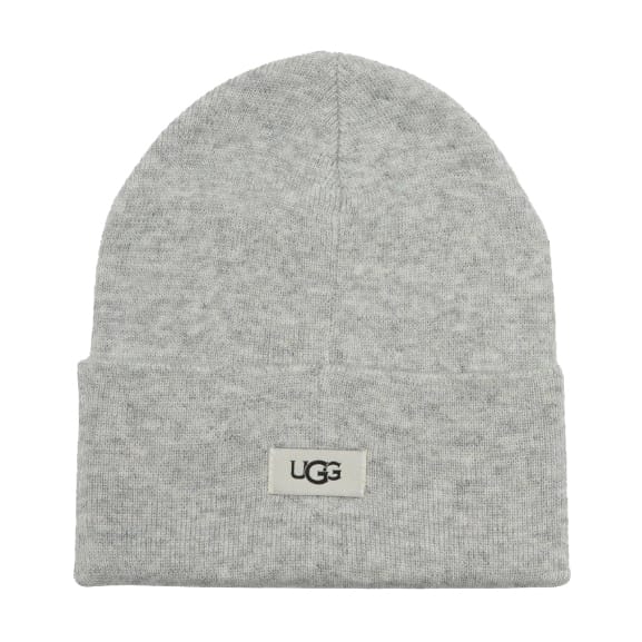 A gray beanie with a folded cuff featuring the UGG logo on a small rectangular patch.