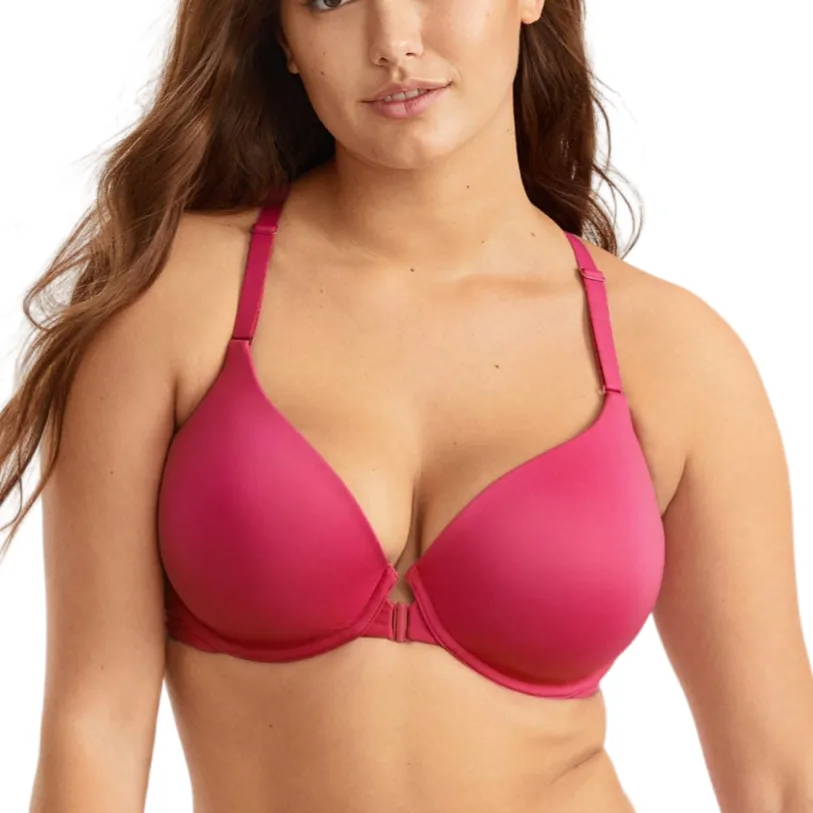 A woman is wearing a magenta bra and matching high-waisted underwear.