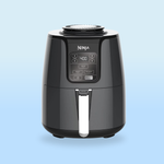 A Ninja air fryer with digital controls, set to 400°F. It features functions like air fry, reheat, and dehydrate.