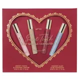 A gift set featuring four 10 mL fragrances: Sweet Tooth, Caramel Dream, Cherry Baby, and Me Espresso, by Sabrina Carpenter. The packaging is heart-themed with a red and gold design.