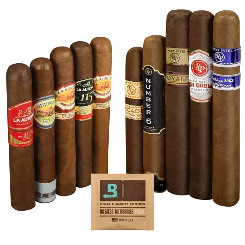 A selection of cigars from brands like La Aurora and Rocky Patel is shown alongside a Boveda 2-way humidity control pack.