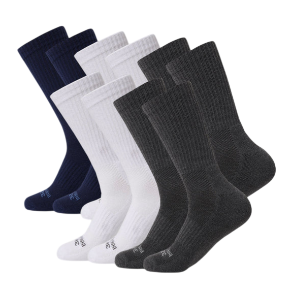 A collection of mid-calf socks in three colors—navy blue, white, and dark gray—displayed in pairs.