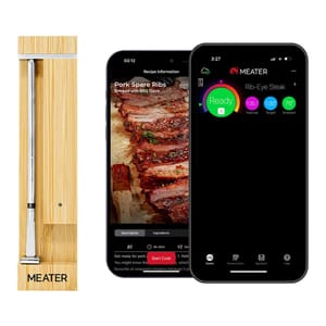 A MEATER smart wireless meat thermometer alongside a smartphone app interface displaying cooking options for pork spare ribs and rib-eye steak temperatures.