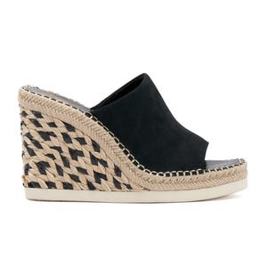 Black wedge sandal with a woven straw design on the heel and a smooth, open-toe upper.