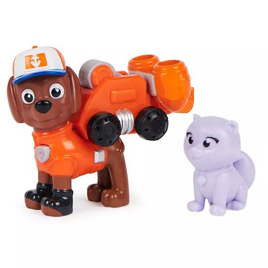 Two toy figures: a brown dog wearing an orange suit with a backpack and a small, purple hippo-like creature.