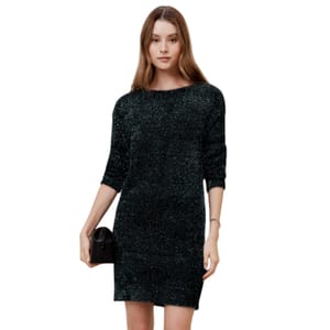 The Banana Republic Factory Tinsel Dress is a shimmering, knee-length dress with three-quarter sleeves and a relaxed fit, made from a glittery fabric. It is accessorized with a small black clutch.