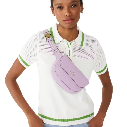 Lavender leather belt bag with a curved shape, gold-tone hardware, adjustable striped strap, and a front flap featuring the Kate Spade logo.