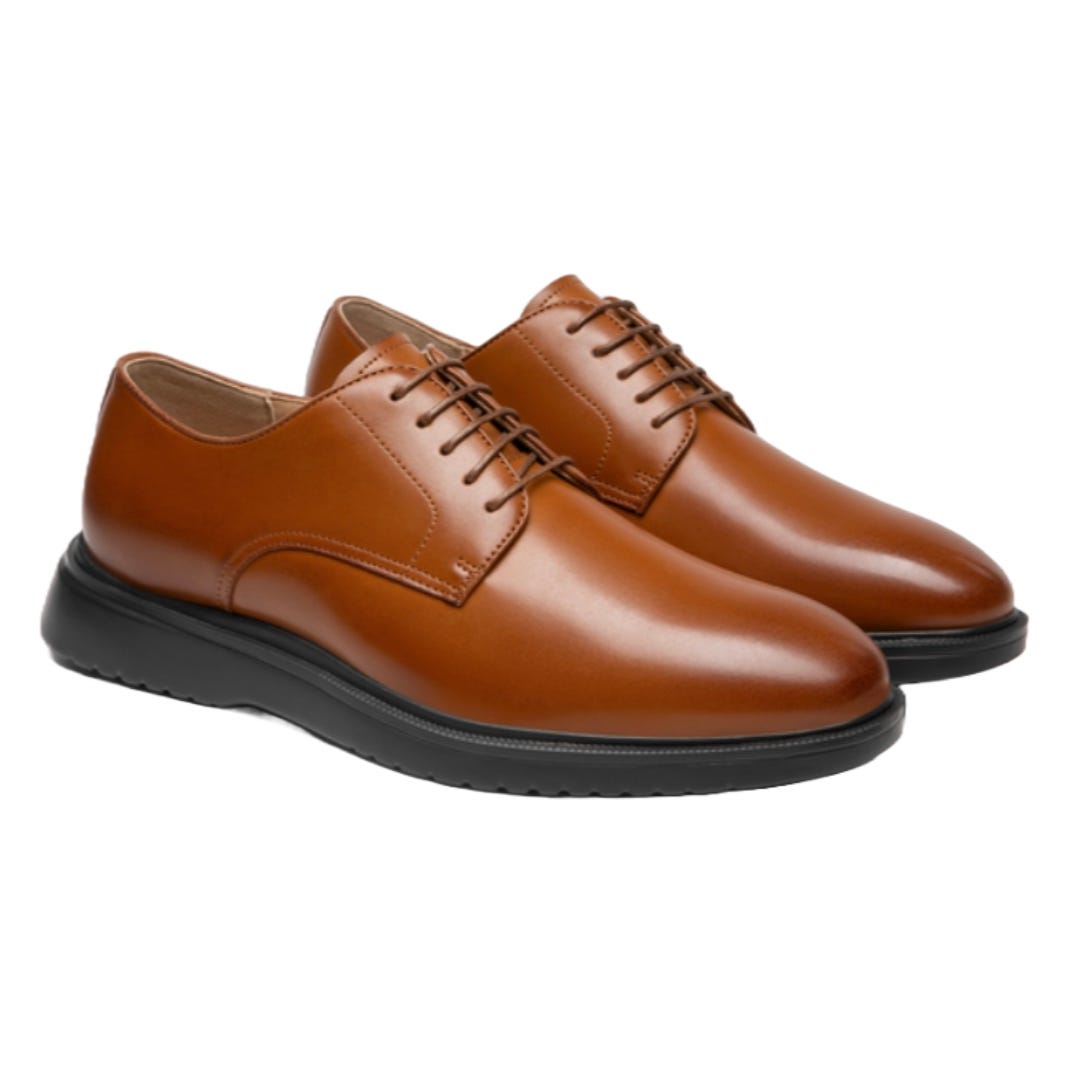 A pair of brown leather Derby shoes with black rubber soles and lace-up design, offering a polished and classic appearance.