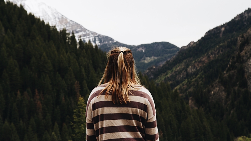 woman camping in the mountains