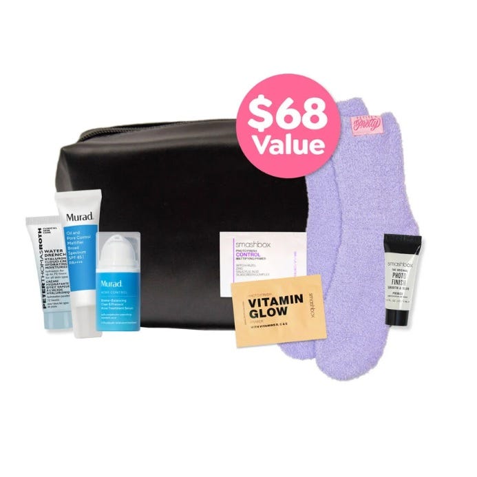 Cosmetic gift set with a $68 value includes two skincare items from Murad, a moisturizer from Peter Thomas Roth, a Vitamin Glow primer sample, lavender socks, a setting powder sample, and a makeup primer, all packed in a black pouch.