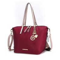 A maroon MKF Convertible Tote with beige handles, detachable shoulder strap, and gold-tone hardware including a circle \“M\“ and heart charm.