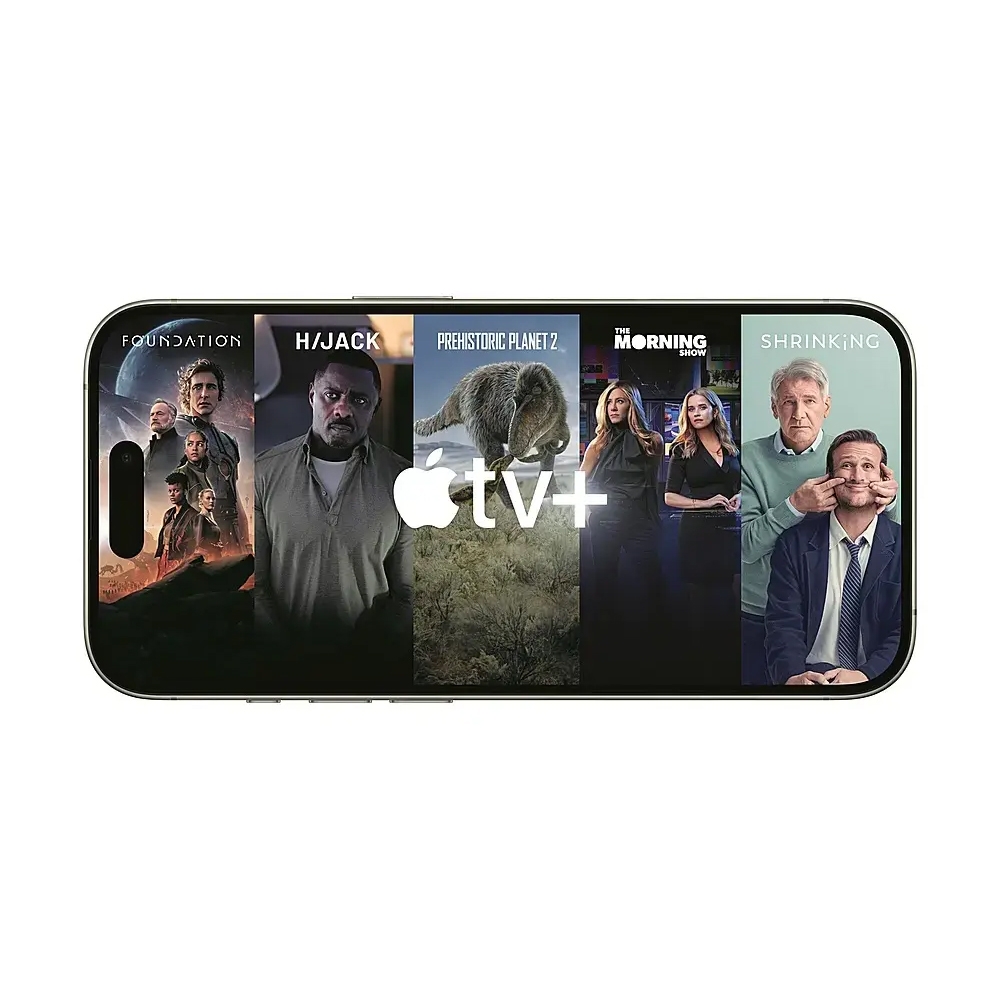 A smartphone screen displays Apple TV+ content, featuring posters for \“Foundation,\“ \“Hijack,\“ \“Prehistoric Planet 2,\“ \“The Morning Show,\“ and \“Shrinking.\“