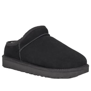 Black slip-on UGG Classic Slippers with a suede upper and a thick, flat rubber sole.