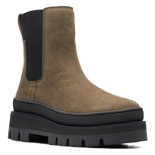 A brown Chelsea boot with a black elastic side panel and a thick black platform sole.