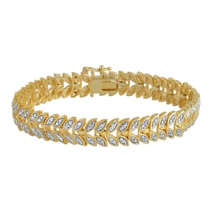 Gold-tone bracelet with diamond-like stones set in a leaf pattern design.