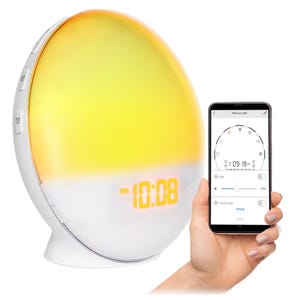 A sunrise alarm clock with a digital display mimicking natural light and a smartphone app interface for light and alarm settings control.