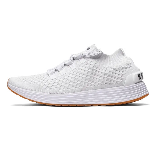 White athletic shoe with a textured knit upper, lace-up design, and a cushioned sole. The sole is white with a light brown gum outsole.